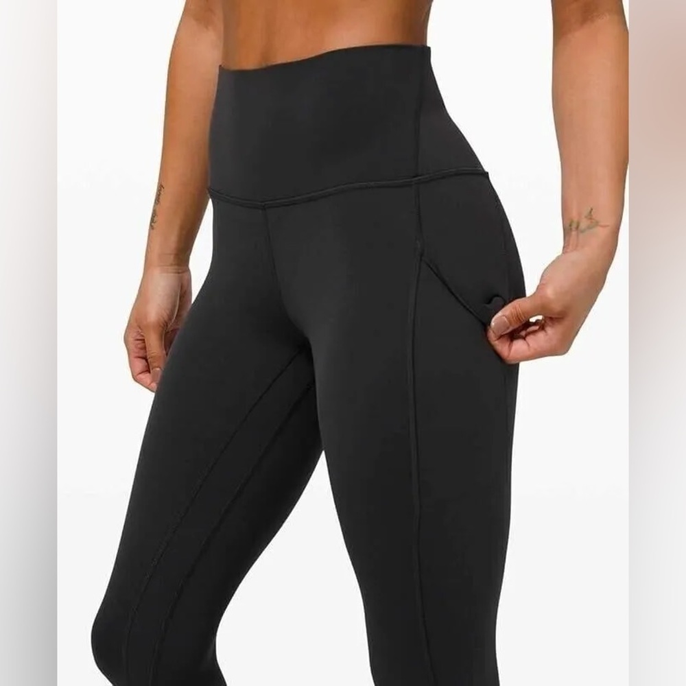 Black Lululemon size 4 leggings with pockets!